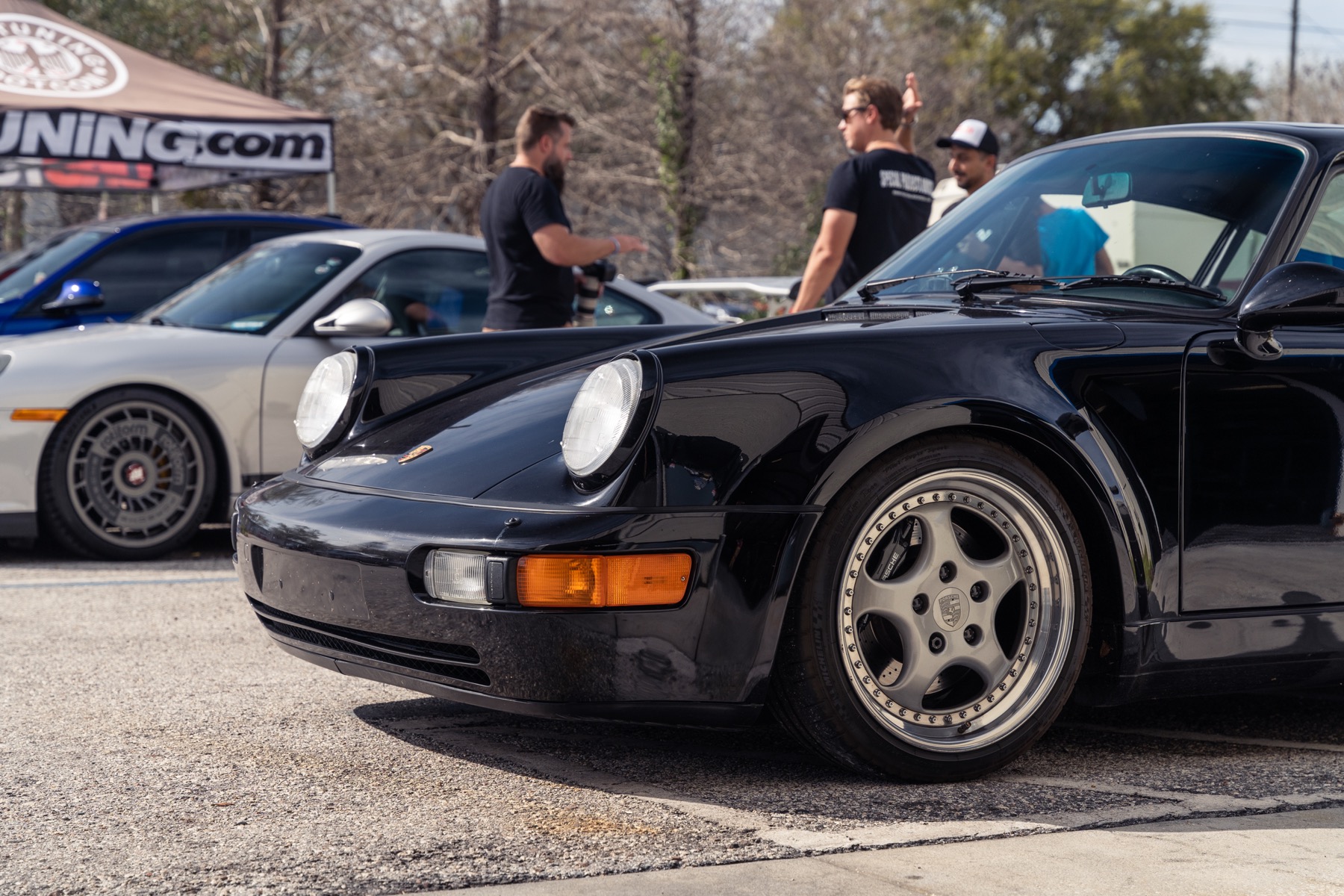 Speed Syndicate performance shop exterior in Pinellas Park, FL with customer cars out front, the team's home base